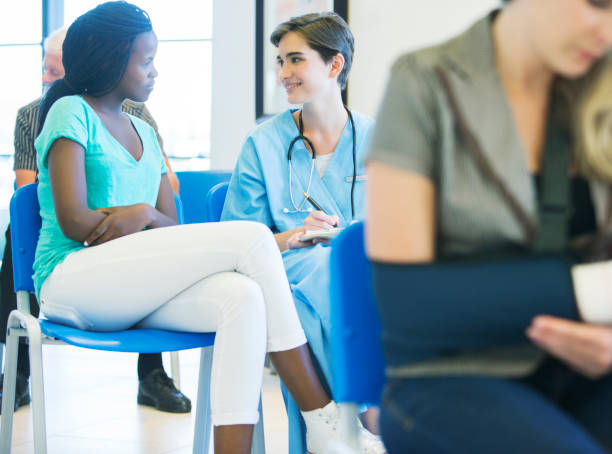 istock Nurse talking to patient in hospital 513438837