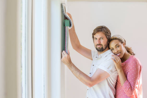 istock Couple looking through fabric swatches together 513438893