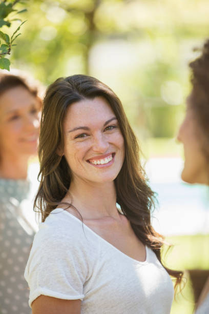 istock Woman smiling outdoors 513438977
