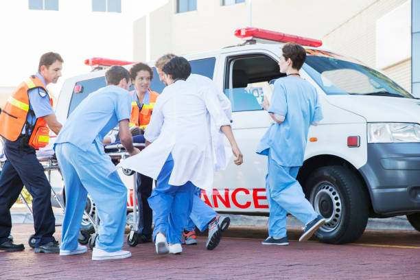Close up of paramedic next to ambulance