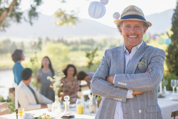 istock Older man enjoying picnic with family 513439139