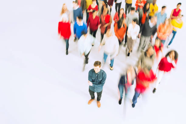 istock Businessman standing out from the crowd 513439429