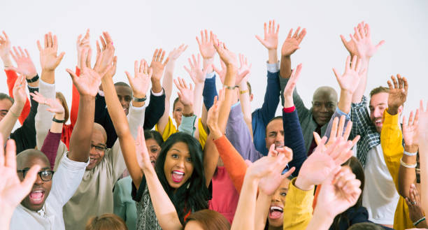 istock Portrait of diverse crowd cheering 513439455