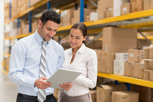 istock Business couple working at a warehouse 513442550