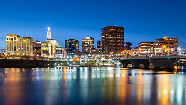 istock Hartford skyline and Founders Bridge at dusk 513443252
