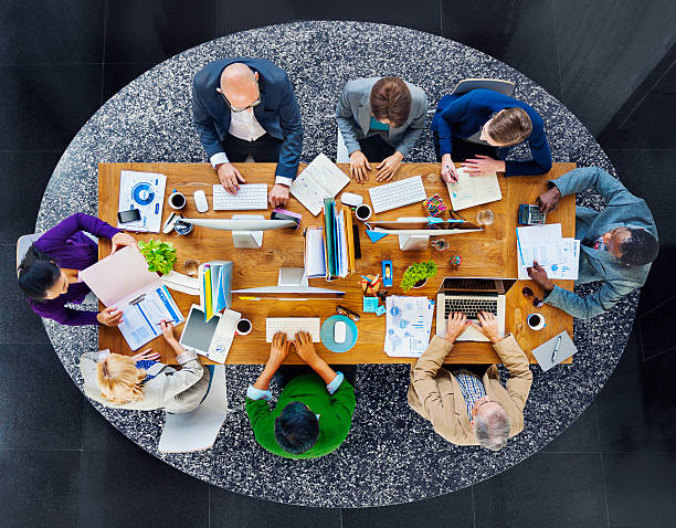 istock Group of Multiethnic Busy People Working in an Office 513443927