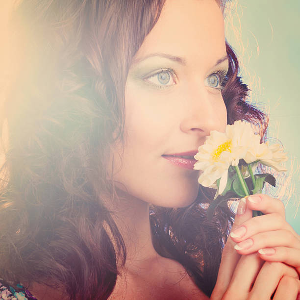 istock woman with flower 513444871