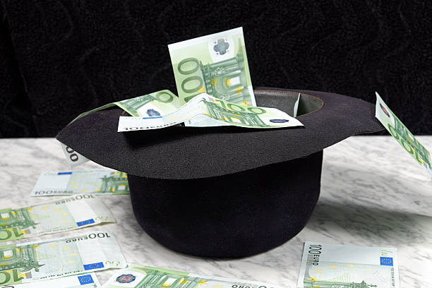 istock One hundred euro banknotes with a black hat 513446426