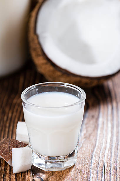 istock Shot Glass with Coconut Liqueur 513450235