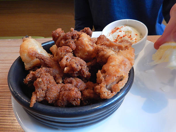 istock Image of deep-fried calamari rings / battered squid with garlic mayonnaise 513468879