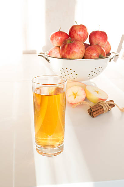 istock apple juice in glass and fresh apples 513469653