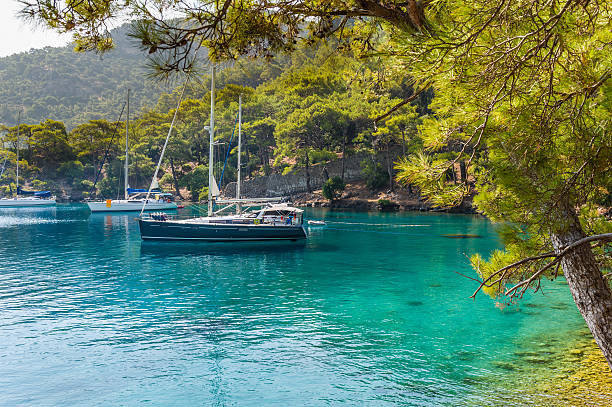 istock Sailing yacht at calm bay 513471379