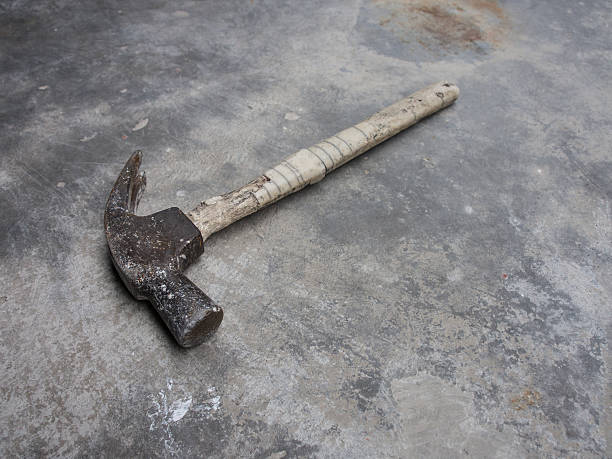 istock steel hammer cement ground 513471594