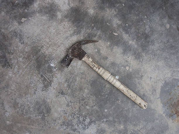 istock steel hammer cement ground 513471736