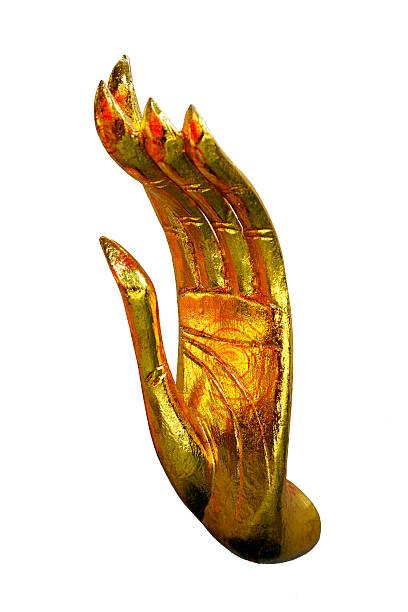 istock Golden hand statue of Buddha isolated on white background 513471796