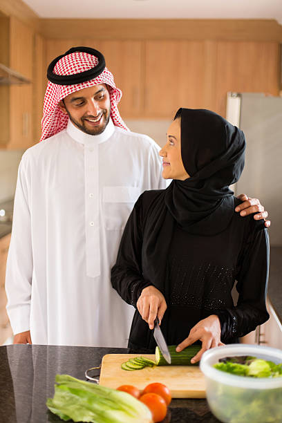 istock arabian couple cooking in home kitchen 513472096