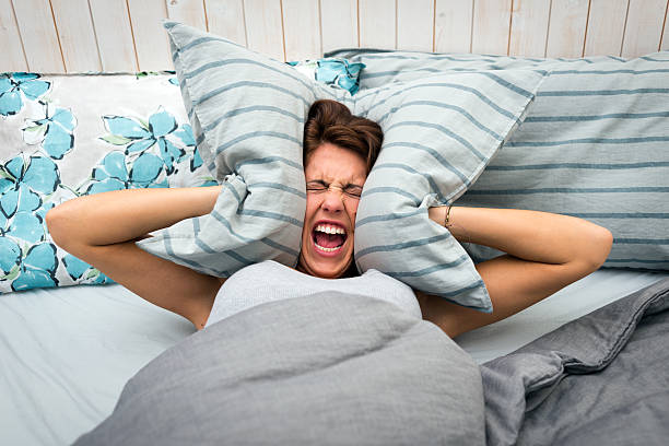 istock In bed: woman can't sleep 513472197