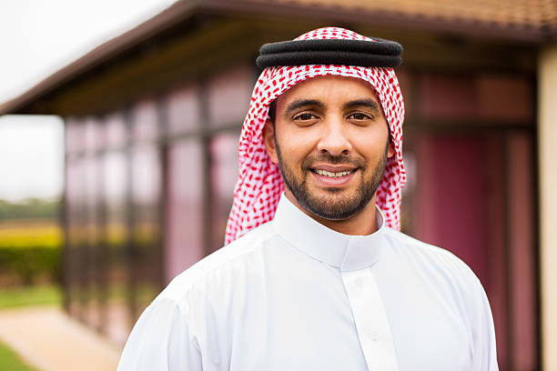 istock middle eastern man outside the house 513472506