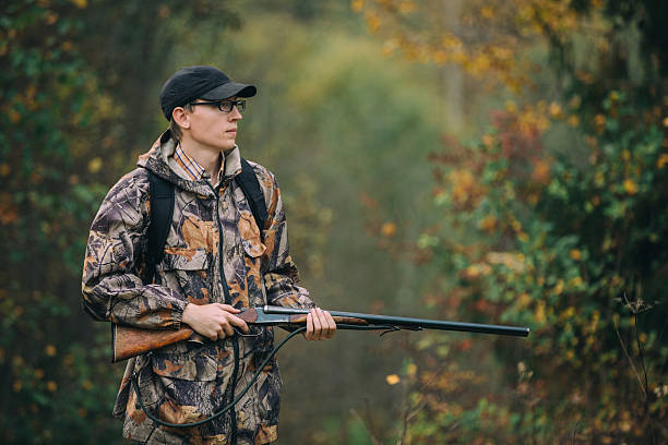 istock Male hunter in the woods 513473158