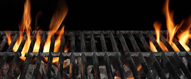 istock Barbecue Fire Grill Isolated On The Black Background, Close Up 513474544