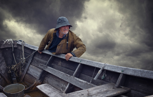 Fisherman Portrait, Stormy Sky and Dory, Nova Scotia