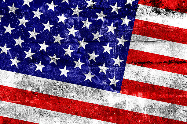 istock USA Flag painted on grunge wall 513475631