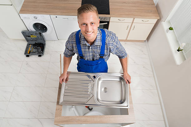 istock Plumber Fixing Stainless Steel Sink 513477856