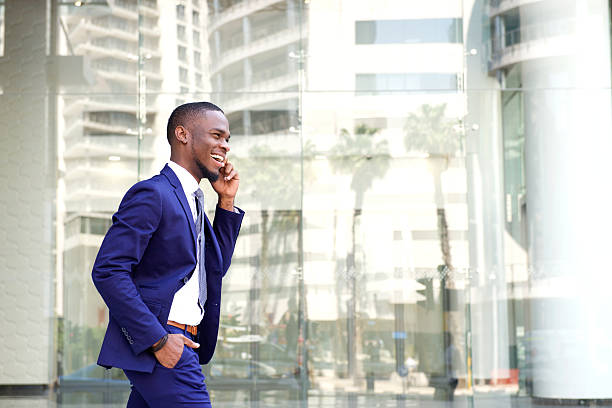 istock Young african businessman talking on cell phone 513480664