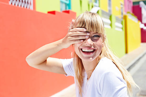 istock Blond woman with hand over eye, portrait 513480770