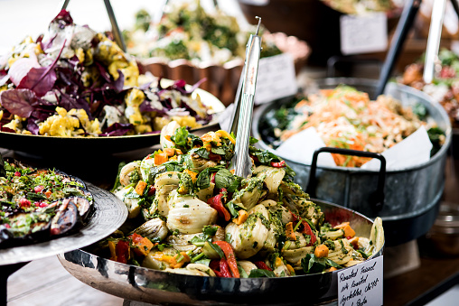 Cropped image of assorted salads in a buffet
