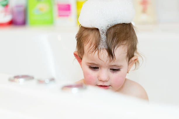 istock little girl taking spa bath 513482906