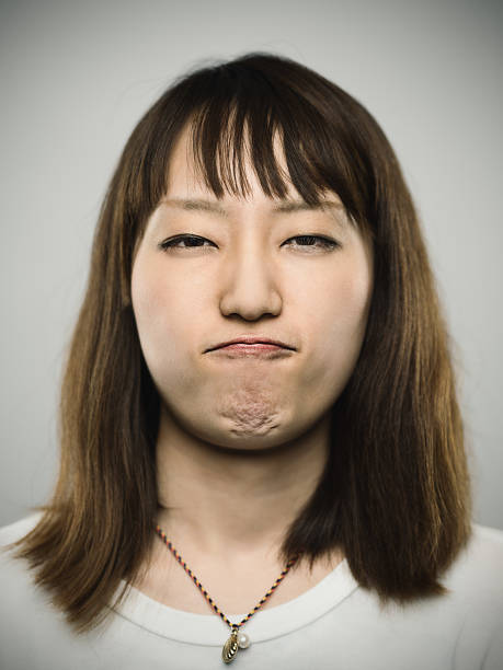 の肖像若い日本人女性。 - serious women human face teenager ストックフォトと画像