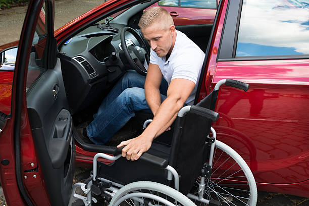 istock Handicapped Car Driver With A Wheelchair 513484186
