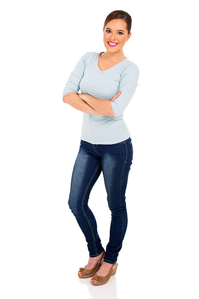 istock young woman with arms folded 513487094