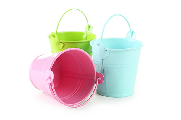 istock Colorful buckets isolated on white 513488212