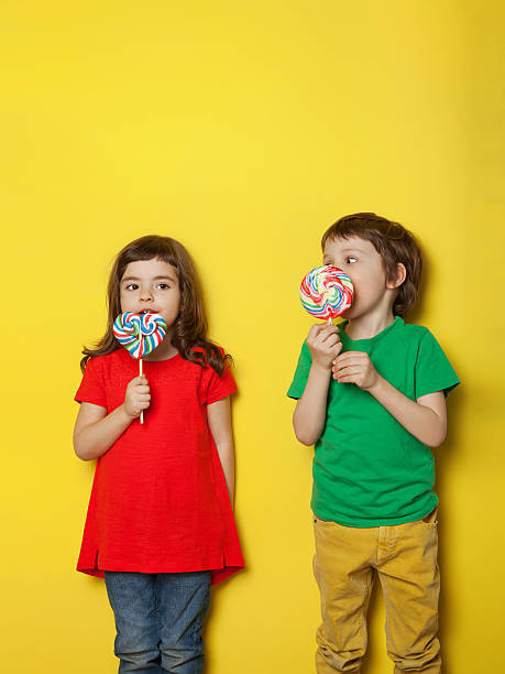 istock Children enjoying lollipop 513488254