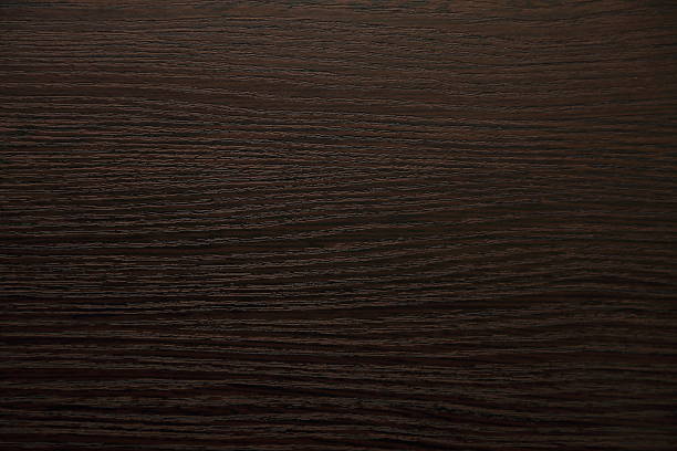 dark wood texture A dark wood texture from a floor walnut wood photos stock pictures, royalty-free photos & images