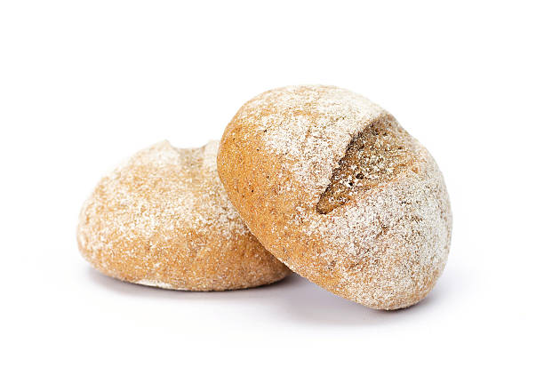 istock Two round buns sprinkled with flour. On white background 513489612