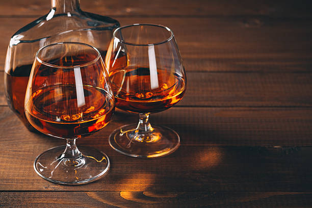 istock Two glasses of cognac and bottle, 513490394