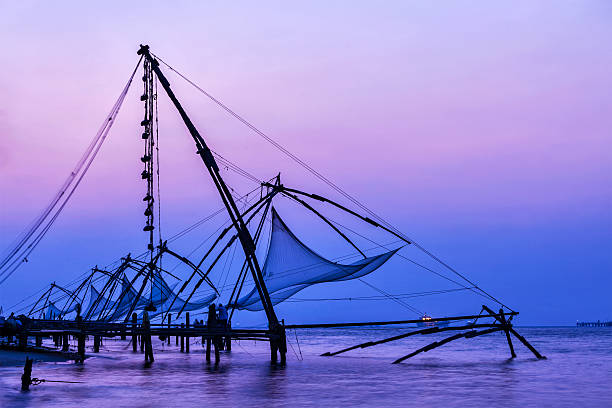 istock Chinese fishnets on sunset. Kochi, Kerala, India 513491410