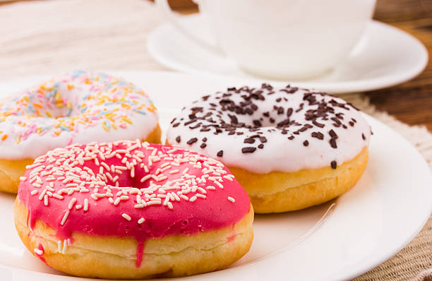 istock donuts and cup of coffee 513491600