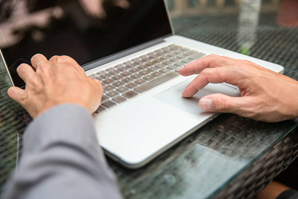 istock Young male typing an email in laptop 513493104