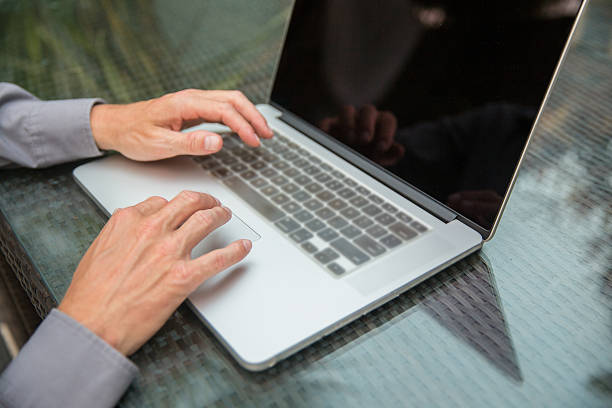 istock Adult men typing on laptop 513493284