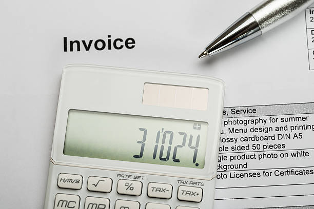 istock Pen With Calculator And Invoice 513495490