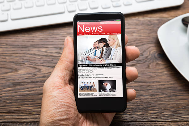 istock Person Hands With Mobile Phone Showing News 513495732