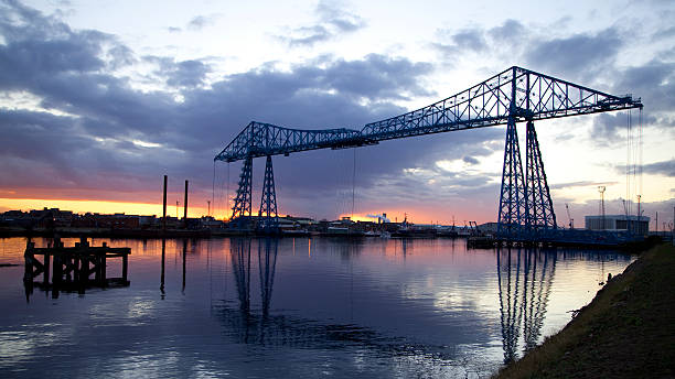 The Transporter Bridge, Teesside, at sunset The transporter bridge, Teesside, silhouetted against an evening sky. middlesbrough stock pictures, royalty-free photos & images