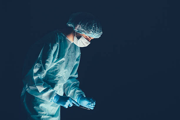 istock Medical team  hospital performing operation. Group of surgeon at work 513496814