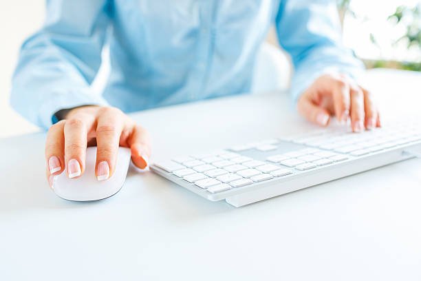 istock Woman office worker typing on the keyboard 513498808