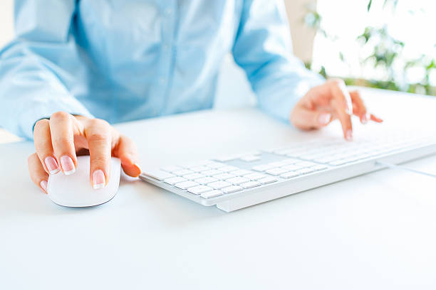 istock Woman office worker typing on the keyboard 513498856
