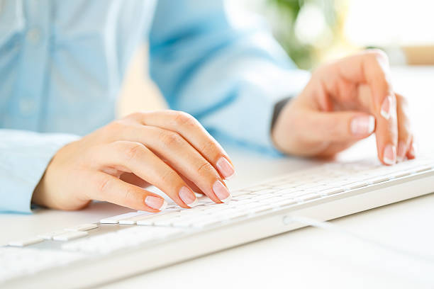 istock Woman office worker typing on the keyboard 513500220